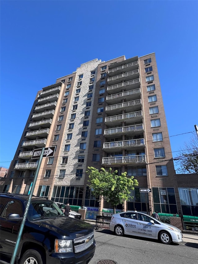 97-12 63rd Dr Unit 10D, Rego Park, NY 11374 - view of apartment building / complex