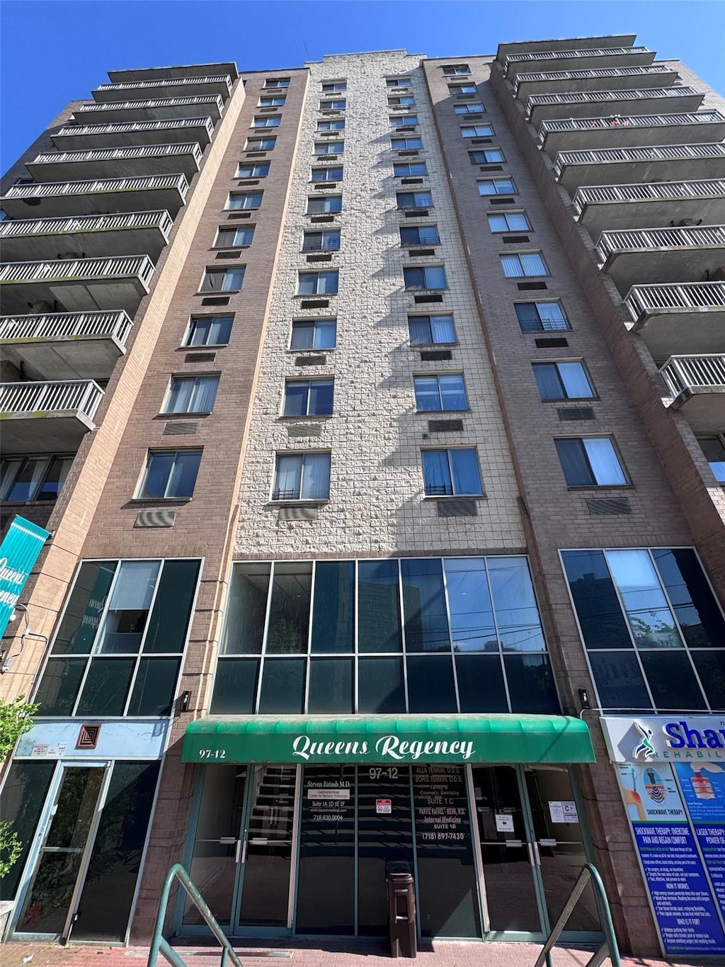 97-12 63rd Dr Unit 10D, Rego Park, NY 11374 - view of apartment building / complex