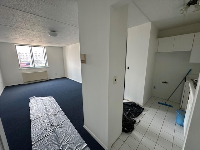 97-12 63rd Dr Unit 10D, Rego Park, NY 11374 - empty room featuring baseboards and light tile patterned floors