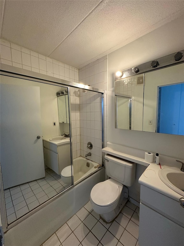 97-12 63rd Dr Unit 10D, Rego Park, NY 11374 - full bath with vanity, bathing tub / shower combination, a textured ceiling, and tile patterned flooring