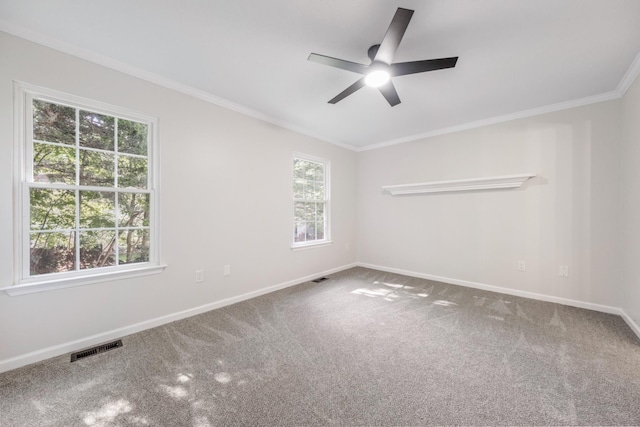 8 Moore Ln, Washingtonville, NY 10992 - spare room featuring crown molding, ceiling fan, carpet, and baseboards