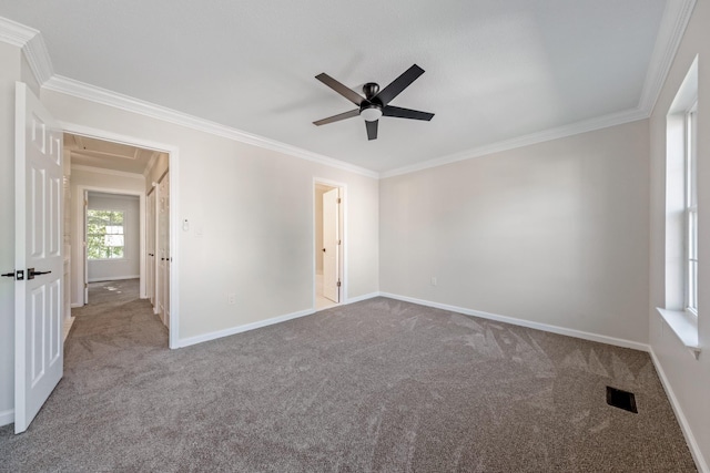 8 Moore Ln, Washingtonville, NY 10992 - empty room featuring carpet floors, ornamental molding, a ceiling fan, attic access, and baseboards