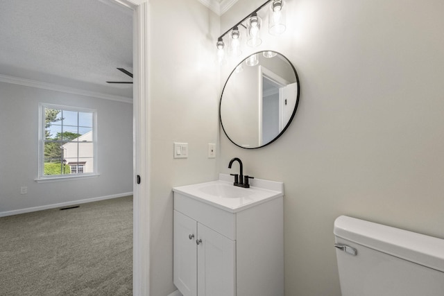8 Moore Ln, Washingtonville, NY 10992 - bathroom featuring crown molding, vanity, toilet, and baseboards