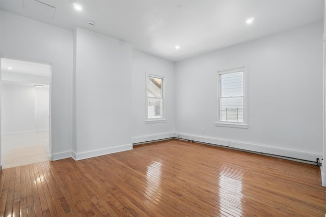 419 S 7th Ave, Mount Vernon, NY 10550 - spare room with hardwood / wood-style flooring and baseboards