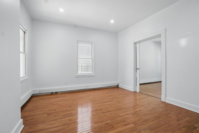 419 S 7th Ave, Mount Vernon, NY 10550 - unfurnished room with wood finished floors, baseboards, and recessed lighting