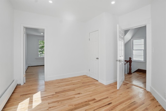 419 S 7th Ave, Mount Vernon, NY 10550 - unfurnished room with a baseboard radiator, light wood-type flooring, recessed lighting, and baseboards