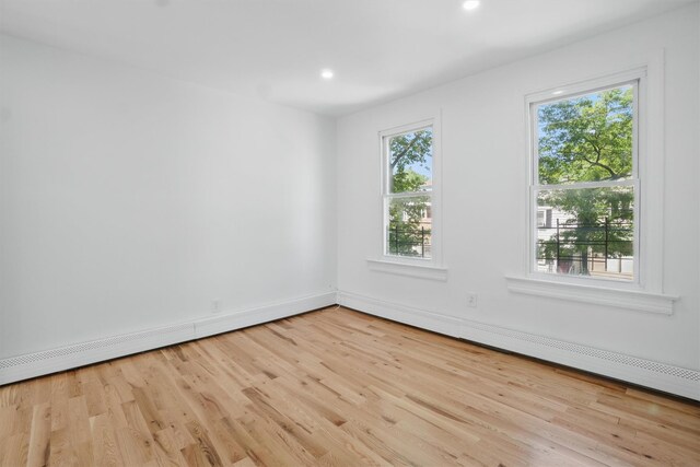 419 S 7th Ave, Mount Vernon, NY 10550 - spare room featuring wood finished floors, baseboards, and recessed lighting