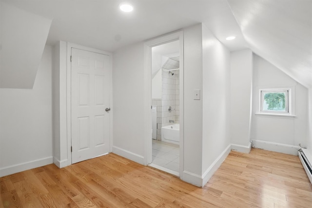 419 S 7th Ave, Mount Vernon, NY 10550 - bonus room featuring light wood finished floors, lofted ceiling, baseboards, recessed lighting, and a baseboard radiator