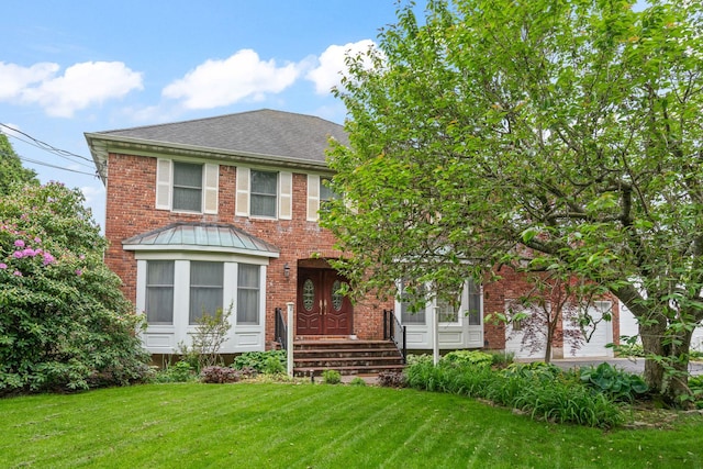 14 Battle Row, Old Bethpage, NY 11804 - view of front facade with brick siding, a front yard, and roof with shingles
