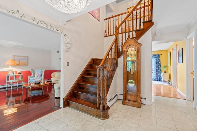14 Battle Row, Old Bethpage, NY 11804 - staircase with crown molding, a chandelier, marble look tile flooring, baseboards, and a baseboard radiator
