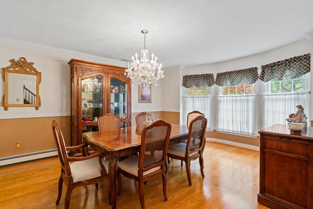 14 Battle Row, Old Bethpage, NY 11804 - dining room with a chandelier, light wood finished floors, and ornamental molding