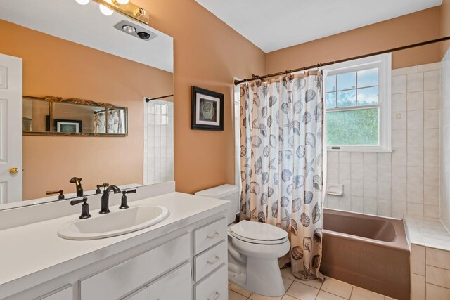 14 Battle Row, Old Bethpage, NY 11804 - bathroom with toilet, vanity, tile patterned floors, and shower / tub combo with curtain