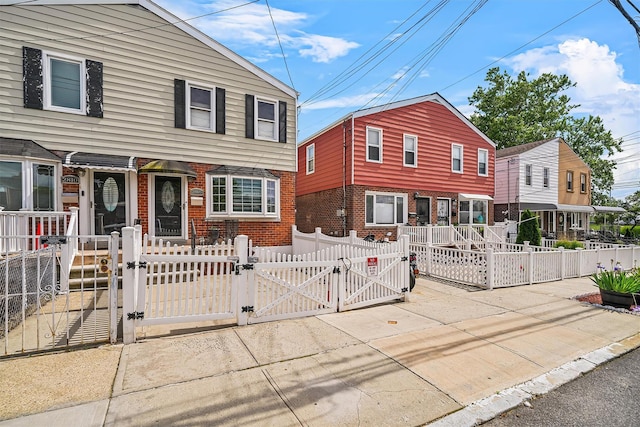 2808 Philip Ave, Bronx, NY 10465 - view of front facade featuring a gate, brick siding, and a fenced front yard