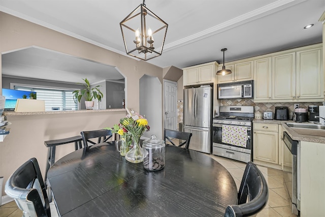 2808 Philip Ave, Bronx, NY 10465 - dining room with a chandelier, light tile patterned flooring, and crown molding
