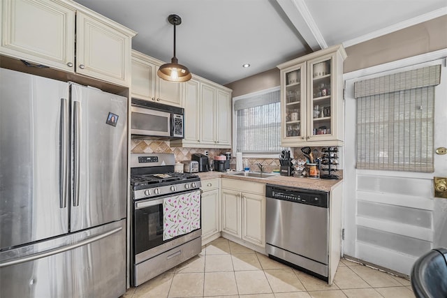 2808 Philip Ave, Bronx, NY 10465 - kitchen featuring stainless steel appliances, a sink, light countertops, backsplash, and light tile patterned floors