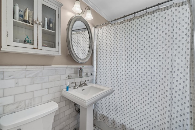 2808 Philip Ave, Bronx, NY 10465 - bathroom with toilet, ornamental molding, tile walls, and curtained shower