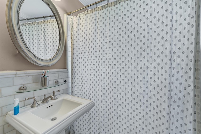 2808 Philip Ave, Bronx, NY 10465 - full bath featuring a sink, tile walls, and wainscoting