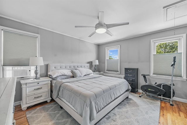 2808 Philip Ave, Bronx, NY 10465 - bedroom with attic access, wood finished floors, ceiling fan, baseboards, and ornamental molding