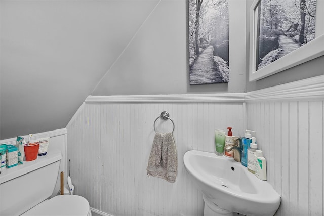 2808 Philip Ave, Bronx, NY 10465 - half bath featuring a wainscoted wall, toilet, and a sink