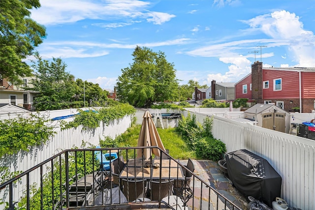 2808 Philip Ave, Bronx, NY 10465 - fenced backyard with outdoor dining space and a residential view