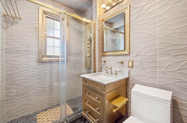 255 Central Ave Unit 202-A, Lawrence, NY 11559 - full bath with tile walls, vanity, and a stall shower