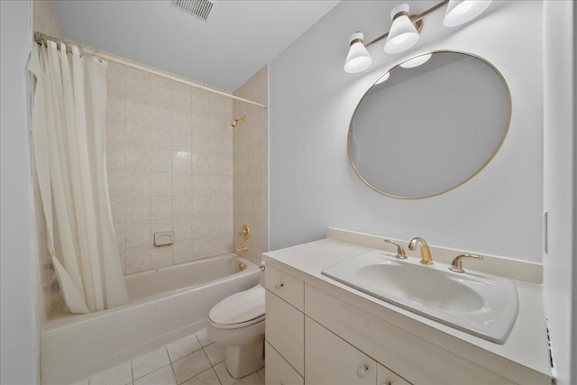 40 Carlisle Ln, East Islip, NY 11730 - full bath with shower / bath combo, vanity, toilet, and tile patterned flooring