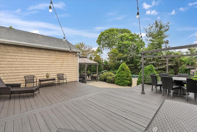 40 Carlisle Ln, East Islip, NY 11730 - wooden terrace with a gazebo and outdoor dining area