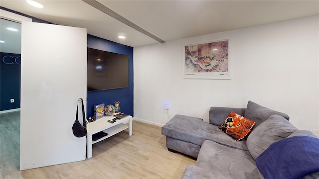 386 Locust Ave, Uniondale, NY 11553 - living room with wood finished floors, baseboards, and recessed lighting