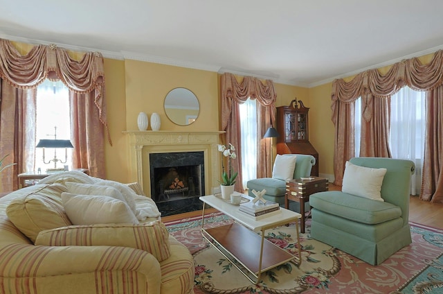106 Garden Rd, Scarsdale, NY 10583 - living area featuring healthy amount of natural light, a fireplace, crown molding, and wood finished floors