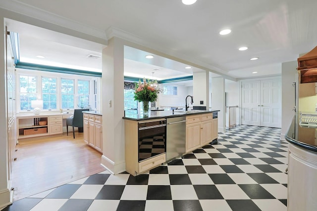 106 Garden Rd, Scarsdale, NY 10583 - kitchen featuring light floors, dishwasher, a sink, dark countertops, and crown molding