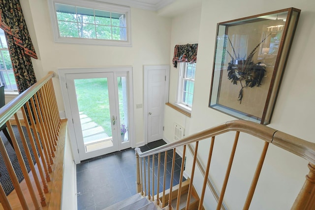 106 Garden Rd, Scarsdale, NY 10583 - tiled entrance foyer with stairs, baseboards, and ornamental molding