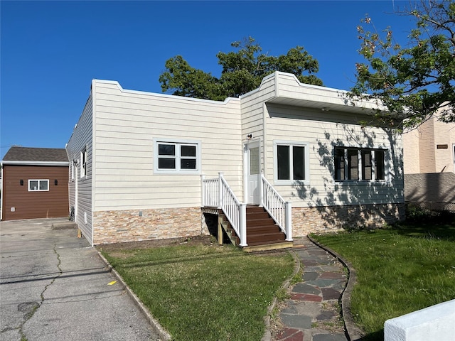 3295 Parkway Dr, Baldwin Harbor, NY 11510 - view of front of property with a front lawn
