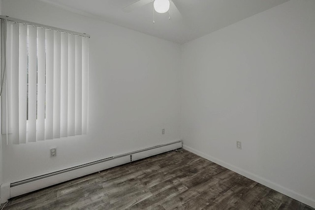 5 Charles St, Selden, NY 11784 - spare room featuring a baseboard heating unit, a ceiling fan, wood finished floors, and baseboards
