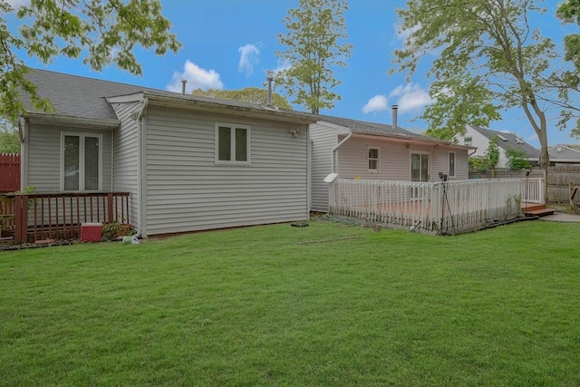 5 Charles St, Selden, NY 11784 - rear view of property with a wooden deck