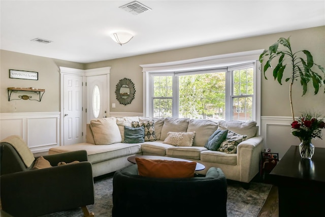 110 Sound Beach Blvd, Sound Beach, NY 11789 - living room with a decorative wall and a wainscoted wall