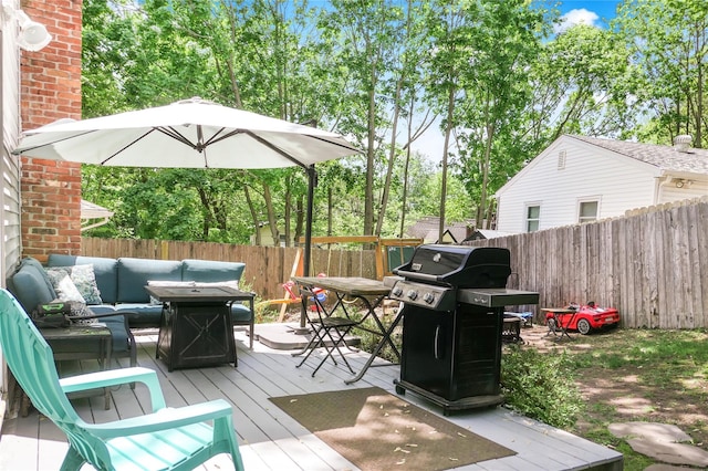 110 Sound Beach Blvd, Sound Beach, NY 11789 - wooden deck with grilling area, an outdoor living space, a fenced backyard, and view of scattered trees