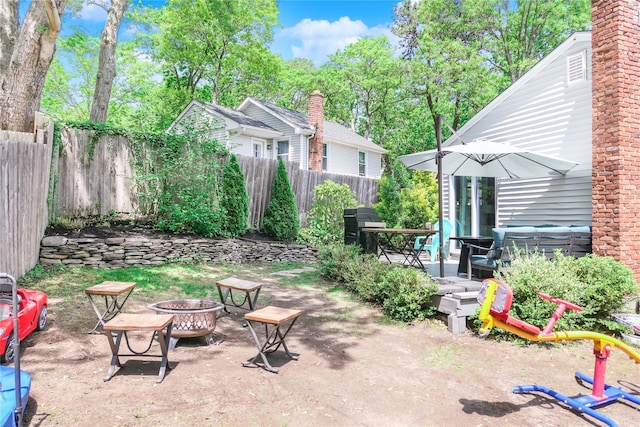 110 Sound Beach Blvd, Sound Beach, NY 11789 - view of patio / terrace featuring an outdoor fire pit