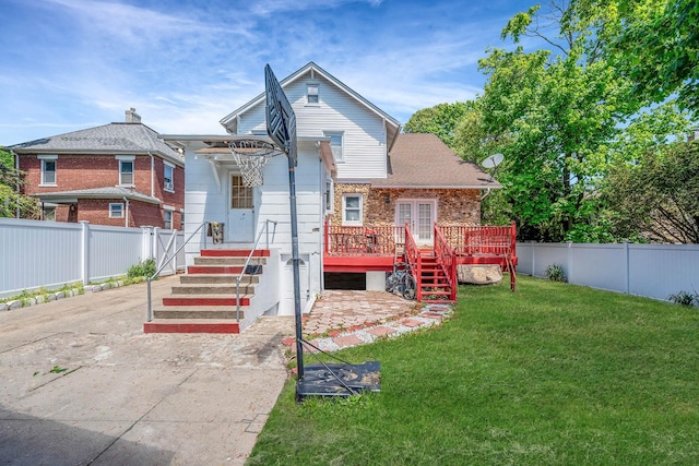 11 Whaley St, Freeport, NY 11520 - rear view of house with a deck