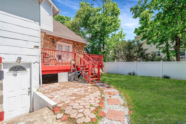11 Whaley St, Freeport, NY 11520 - view of yard featuring a wooden deck, stairway, and a patio area