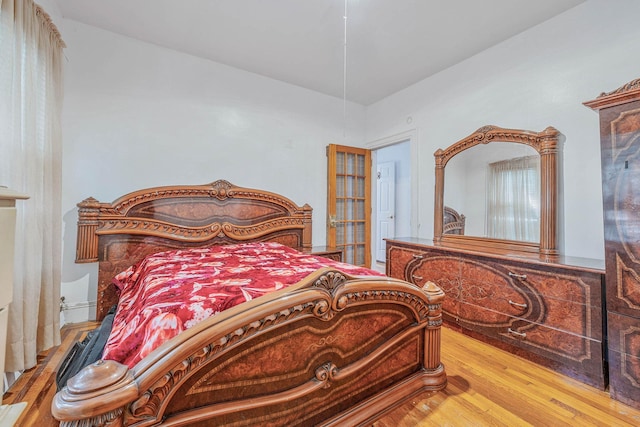 11 Whaley St, Freeport, NY 11520 - bedroom with wood finished floors
