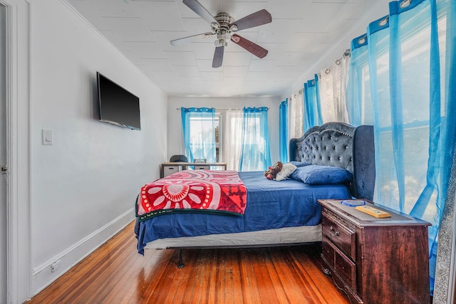 11 Whaley St, Freeport, NY 11520 - bedroom featuring wood-type flooring, baseboards, and ceiling fan