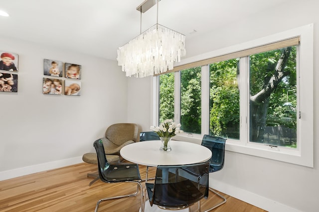 2 Lundy Ln, Larchmont, NY 10538 - dining space featuring baseboards, plenty of natural light, and wood finished floors