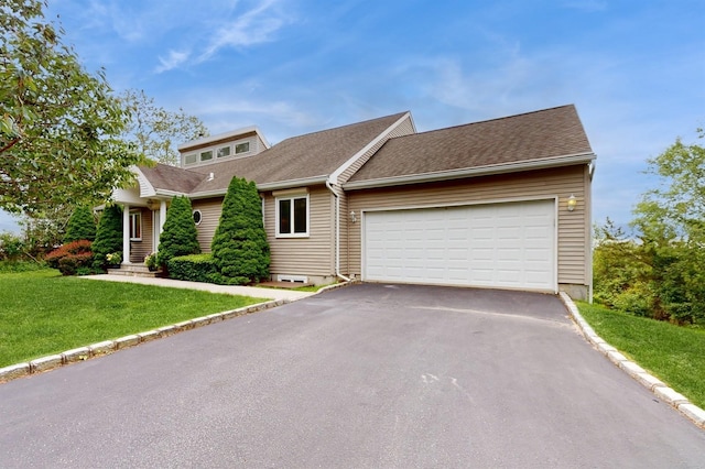 70 Jean Ct, Riverhead, NY 11901 - view of front facade featuring asphalt driveway, an attached garage, a front yard, and a shingled roof