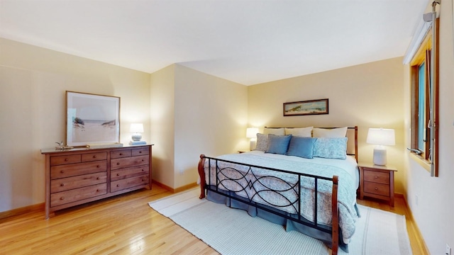 70 Jean Ct, Riverhead, NY 11901 - bedroom with light wood-type flooring and baseboards