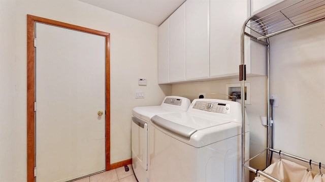 70 Jean Ct, Riverhead, NY 11901 - laundry area featuring separate washer and dryer, cabinet space, and light tile patterned floors