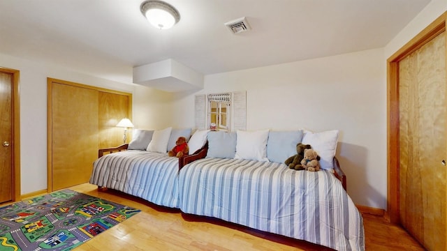 70 Jean Ct, Riverhead, NY 11901 - bedroom with wood finished floors
