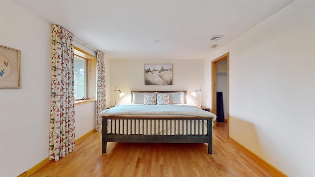 70 Jean Ct, Riverhead, NY 11901 - bedroom with wood finished floors and baseboards