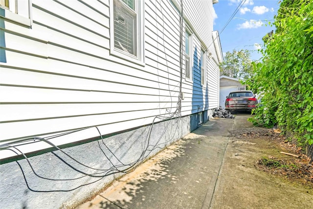 225-35 106th Ave, Queens Village, NY 11429 - view of side of property with a garage