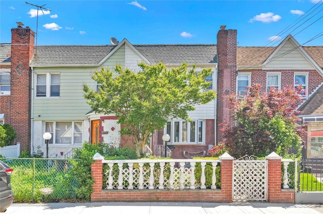 113-23 204th St, Saint Albans, NY 11412 - view of front of house with a chimney