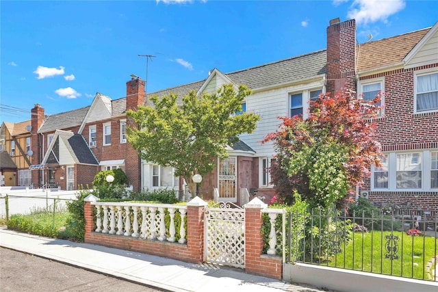 113-23 204th St, Saint Albans, NY 11412 - townhome / multi-family property with a fenced front yard